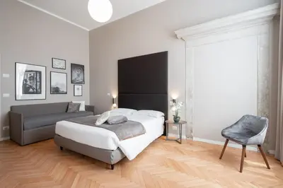 Letto o letti in una camera di Hotel Palazzo Martinelli Dolfin