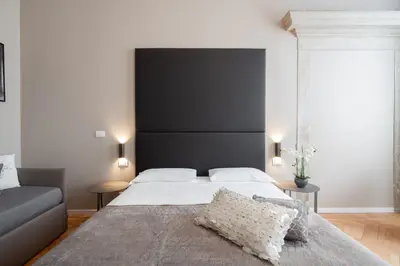 Letto o letti in una camera di Hotel Palazzo Martinelli Dolfin