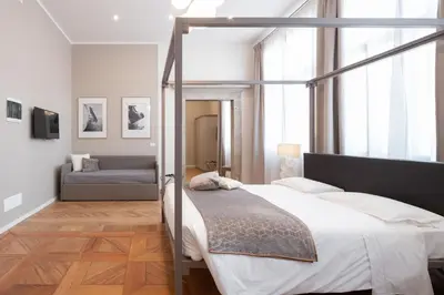 Letto o letti in una camera di Hotel Palazzo Martinelli Dolfin