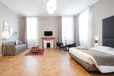 Letto o letti in una camera di Hotel Palazzo Martinelli Dolfin
