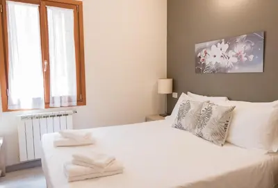 Letto o letti in una camera di Casanova ai Tolentini