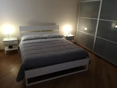 Letto o letti in una camera di PATAVIUM APARTMENT