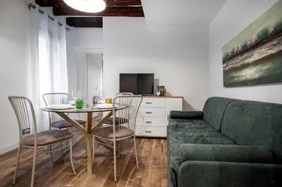 Area soggiorno di Dorsoduro Suite 1241 by Wonderful Italy