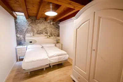 Letto o letti in una camera di ALLOGGI G e G