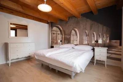 Letto o letti in una camera di ALLOGGI G e G