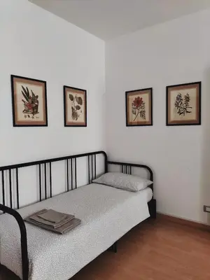 Letto o letti in una camera di Riviera Garibaldi