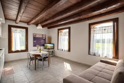 Area soggiorno di BACO DA SETA RESIDENCE con PISCINA - Venezia Mestre