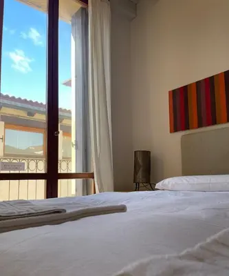 Letto o letti in una camera di Il Palazzetto