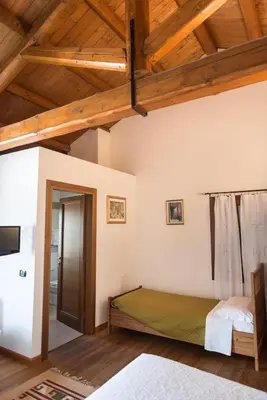 Letto o letti in una camera di Agriturismo Corte Del Brenta