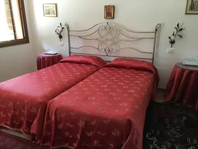 Letto o letti in una camera di Agriturismo Da Ninoti
