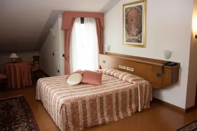 Letto o letti in una camera di Hotel Piroga Padova