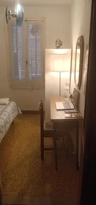 Letto o letti in una camera di Renato House