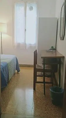 Letto o letti in una camera di Renato House