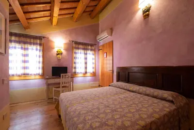Letto o letti in una camera di Rosalimone B&B