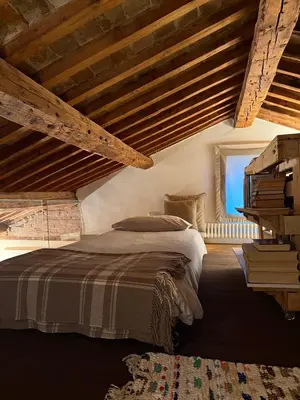 Letto o letti in una camera di Casa Augusta