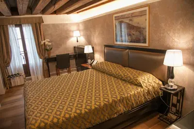 Letto o letti in una camera di EGO' Residence Venice