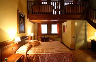 Letto o letti in una camera di Barchessa Contarini