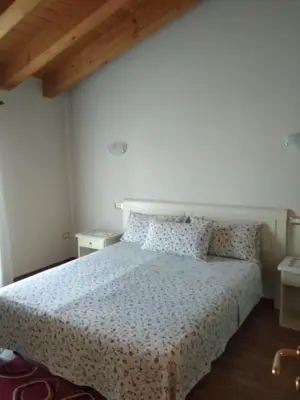 Letto o letti in una camera di B&B Al Lauro