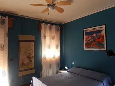 Letto o letti in una camera di B&B William