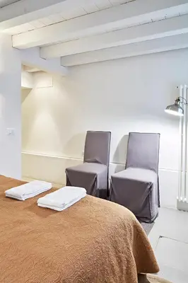Letto o letti in una camera di Ca' Widmann