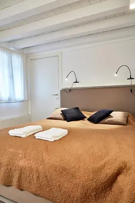 Letto o letti in una camera di Ca' Widmann
