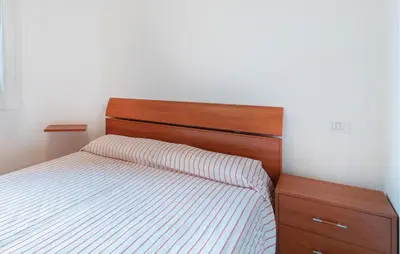 Letto o letti in una camera di Lovely Apartment In Rosolina Mare