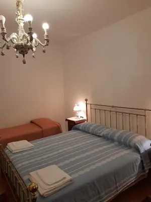 Letto o letti in una camera di come a casa tua dietro piazza San Marco