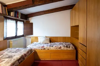 Letto o letti in una camera di Hostmate - Venezia - Piazza San Marco