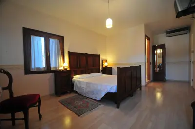 Letto o letti in una camera di Locanda Sant'Anna Hotel