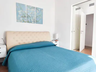 Letto o letti in una camera di VILLAGGIO LIDO - Cavallino