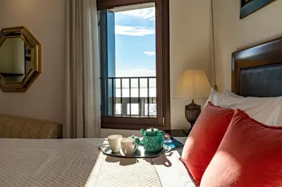 Letto o letti in una camera di Fenix Turandot Suite