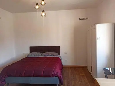 Letto o letti in una camera di Da Caterina Appartamento Con Cucina