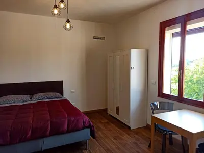 Letto o letti in una camera di Da Caterina Appartamento Con Cucina