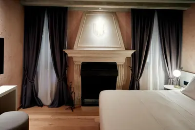 Letto o letti in una camera di Ca' dei Proverbi Suites - WENICE Deep Culture