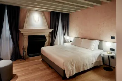Letto o letti in una camera di Ca' dei Proverbi Suites - WENICE Deep Culture