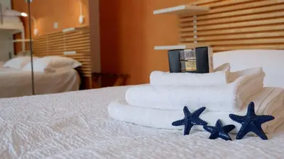 Letto o letti in una camera di Hotel Venezuela