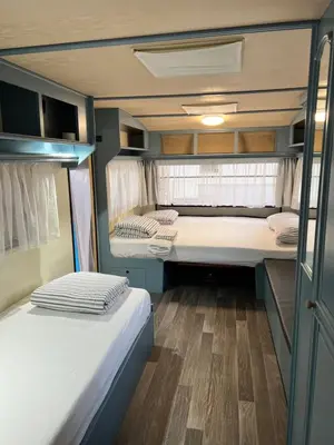 Letto o letti in una camera di Caravan Cavallino - Valentini in Campeggio Union Lido