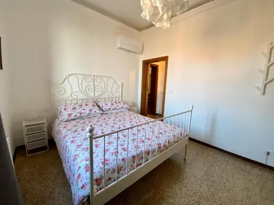 Letto o letti in una camera di Calle San Giacomo Apartment