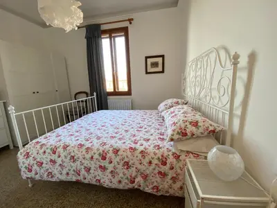 Letto o letti in una camera di Calle San Giacomo Apartment