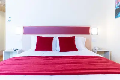 Letto o letti in una camera di Hotel Autoespresso Venice - Atika & Atif