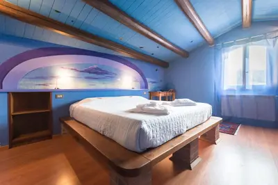 Letto o letti in una camera di Agriturismo Podere Villa Alessi