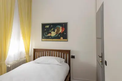 Letto o letti in una camera di Seven Suites Pieve