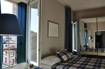 Letto o letti in una camera di Piazza Alta Penthouse