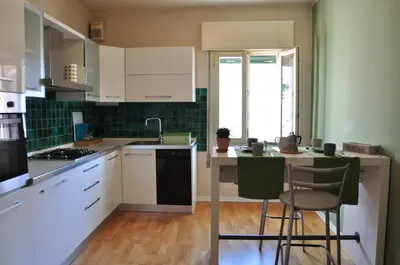 Cucina o angolo cottura di Piazza Alta Penthouse