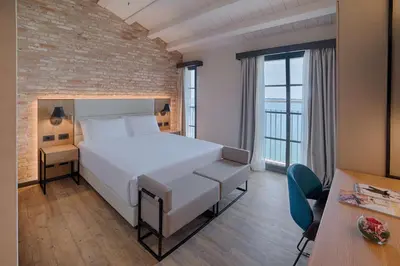 Letto o letti in una camera di NH Collection Murano Villa