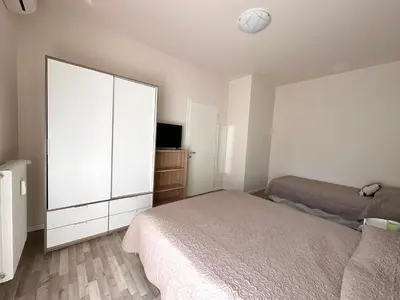 Letto o letti in una camera di Casa TOÈ