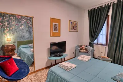 Letto o letti in una camera di Biennale Venice Charme Apartment