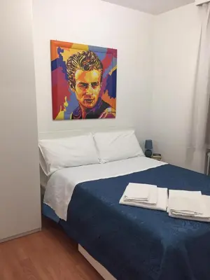 Letto o letti in una camera di Al teatro
