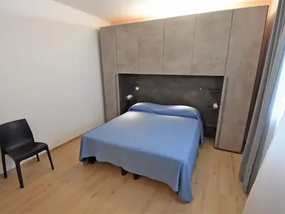 Letto o letti in una camera di Villa Cà Riviera Bosco Piccolo by Interhome
