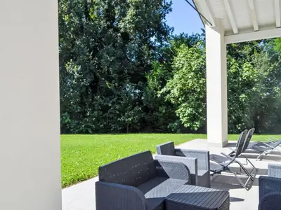 Giardino di Villa Cà Riviera Bosco Piccolo by Interhome